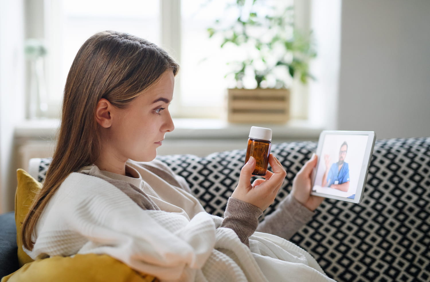 Patient en téléconsultation avec un médecin pour un arrêt de travail en ligne